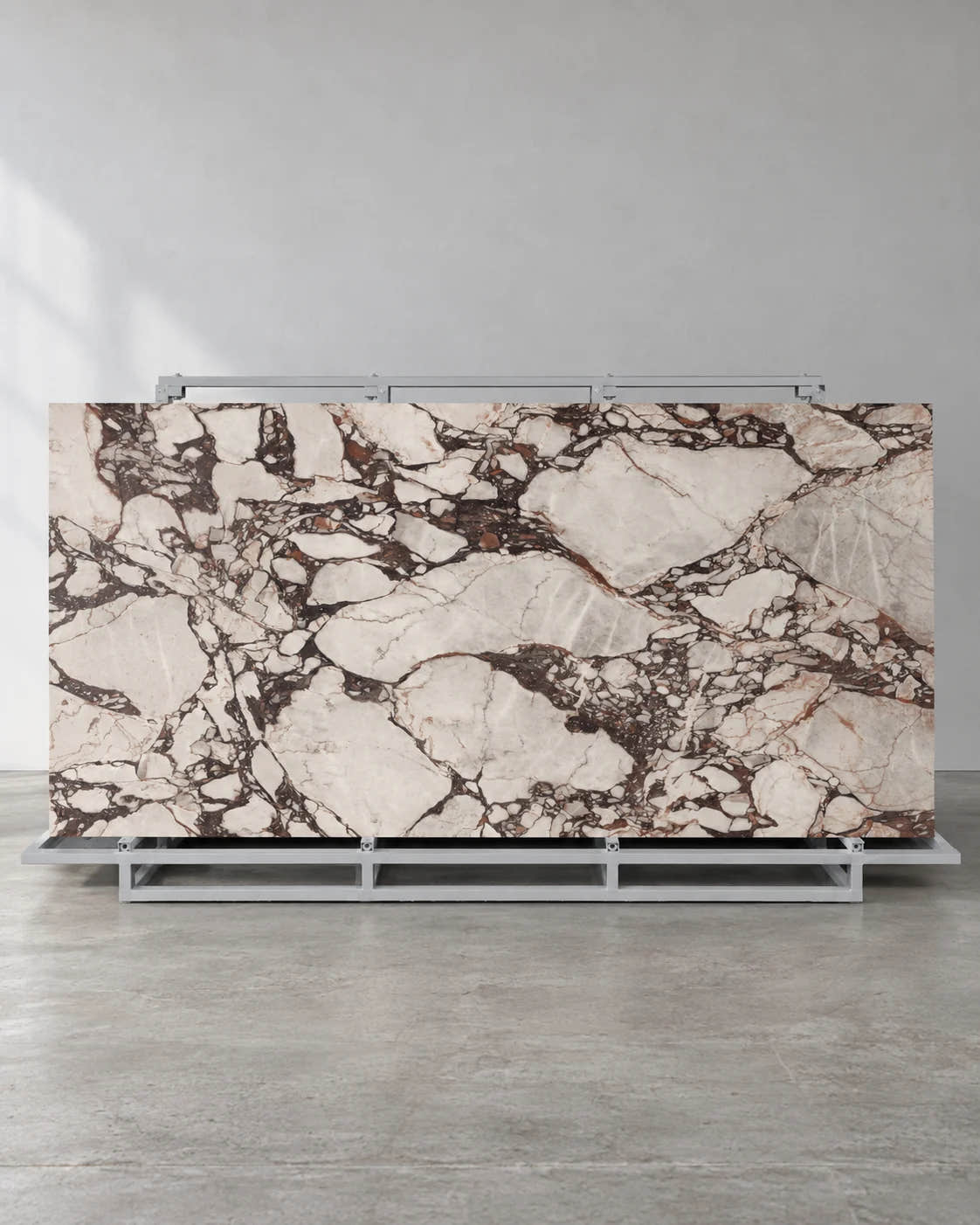 Boutique Bvlgari Purple sintered stone slab with ivory fragments and dark veins on a complete A-frame