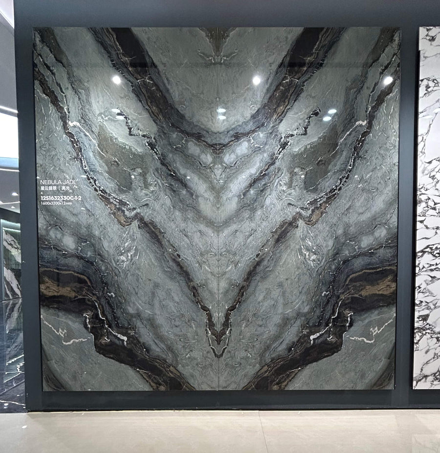 Nebula Emerald sintered stone slab with a dark green ground and stormy gold-grey veining
