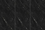 Close-up of Guci Black sintered stone panel showing surface pattern