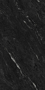 Close-up of Guci Black sintered stone panel showing surface pattern, front view