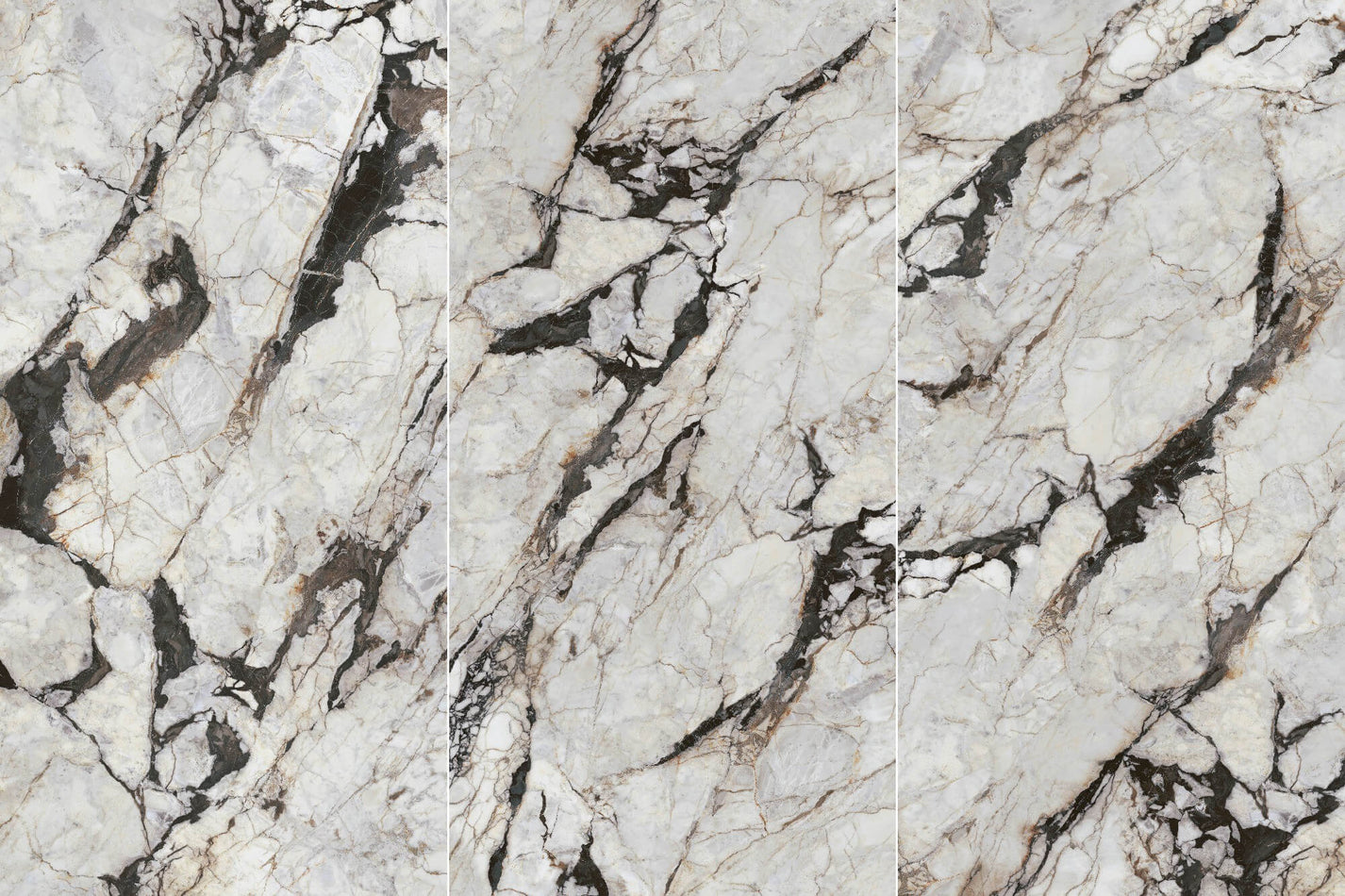 Three Ibiza Luxury Stone faces with bold black and warm-brown mineral veins