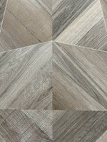Gros plan de triangles entrecroisés à veinage bois beige et gris — pierre frittée Light Shipwood Geometric Wood Look