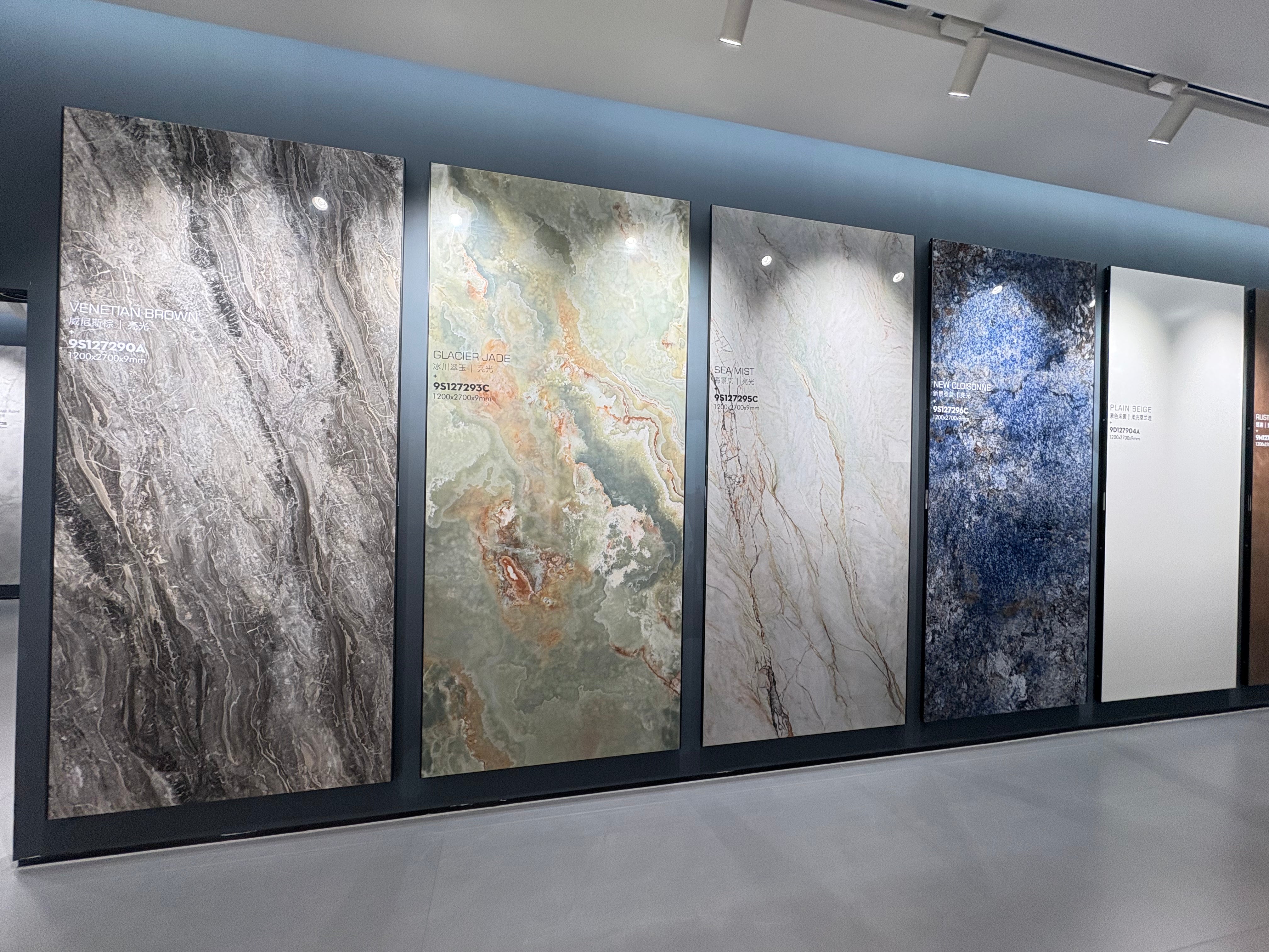 Showroom display of large format sintered stone slab designs