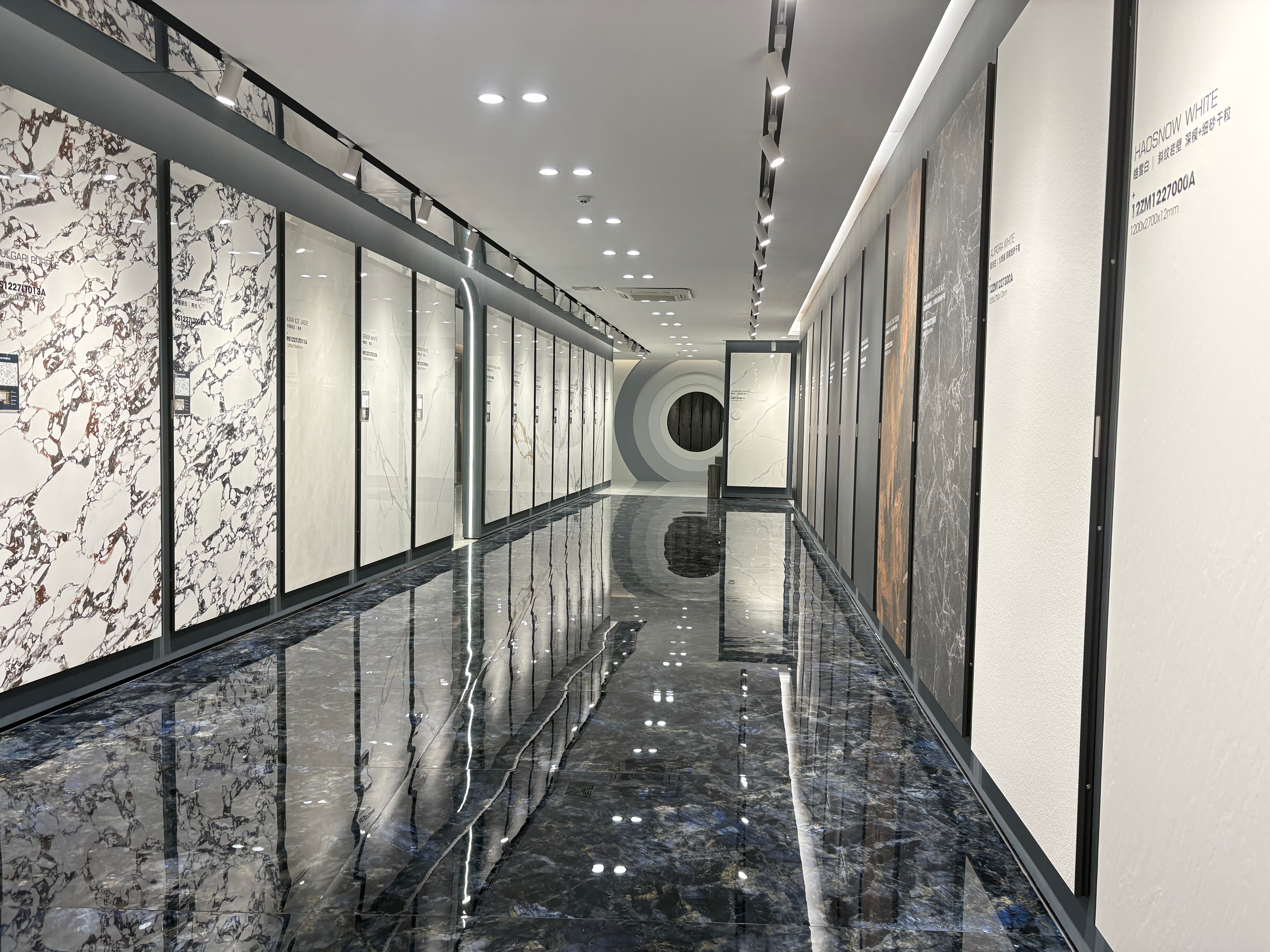 Showroom corridor with large format marble-look sintered stone slabs