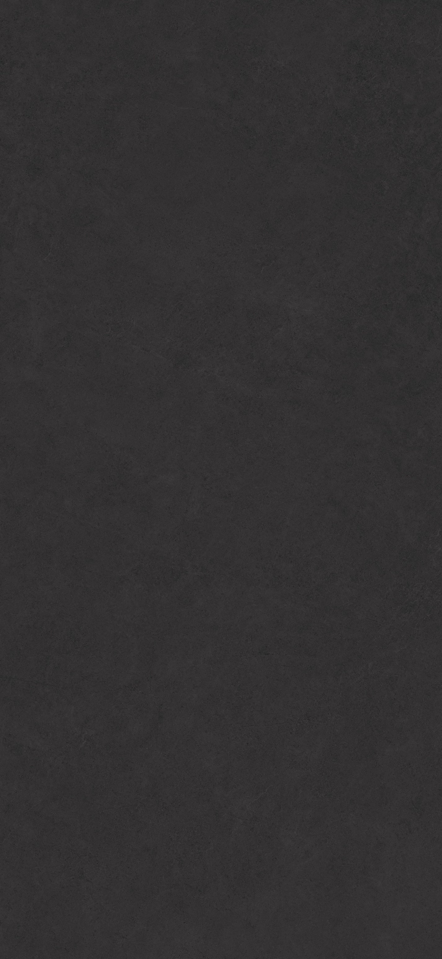 Крупный план плиты из спеченного камня Rock Grey Stone Look, показывающий движение серого камня, детали поверхности