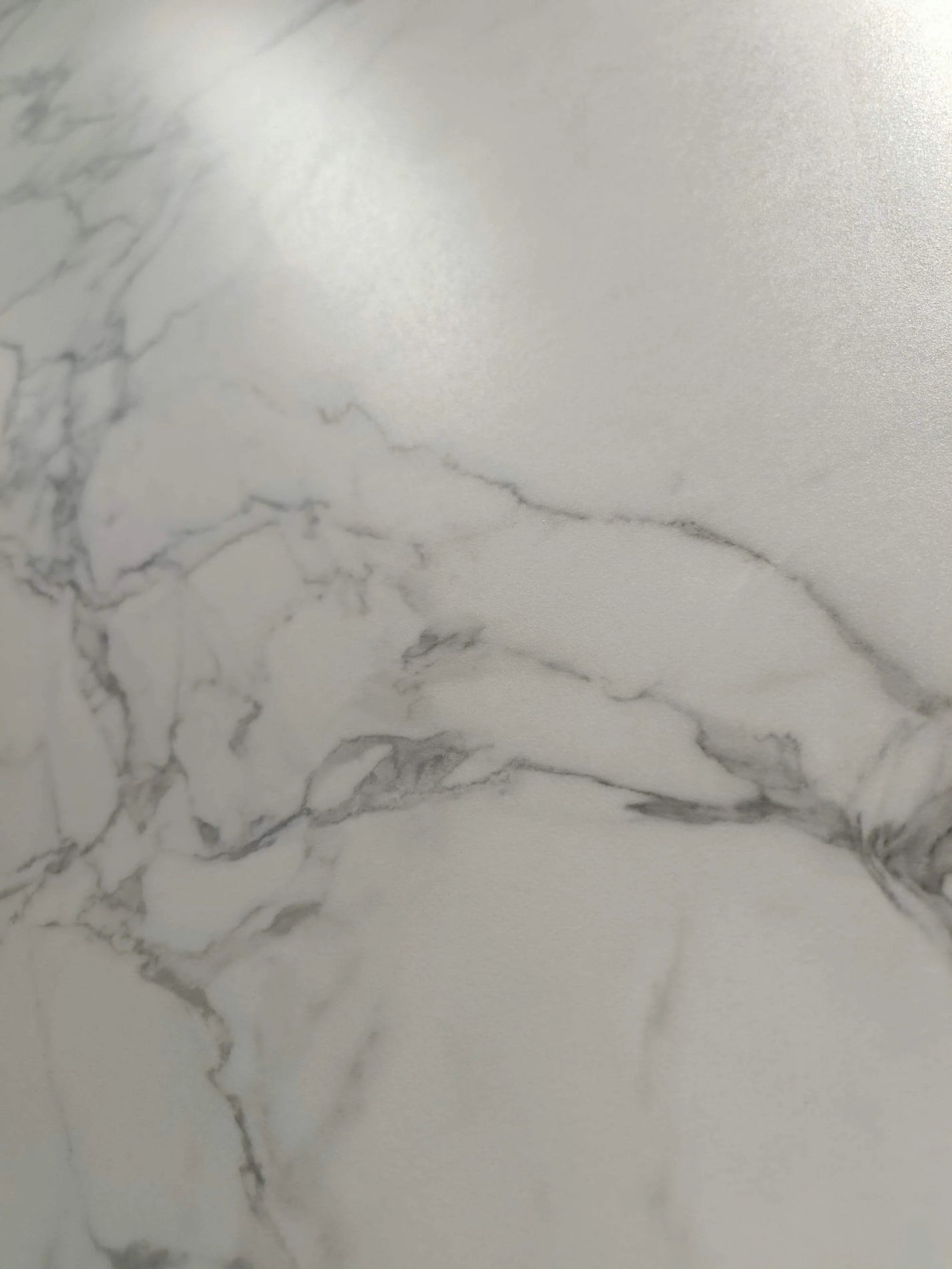 Soft cloudy white area within the Alabaster fine-matte pattern