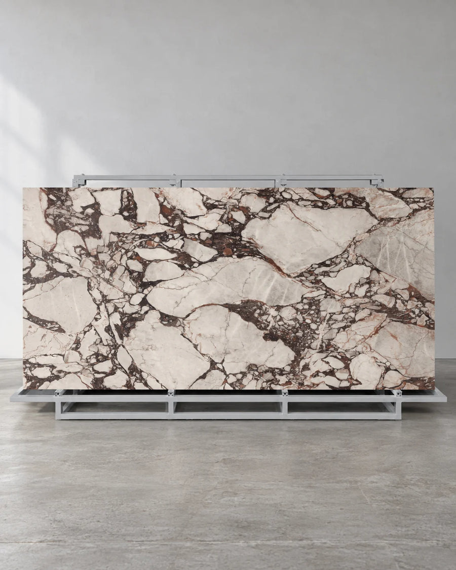 Boutique Bvlgari Purple sintered stone slab with ivory fragments and dark veins on a complete A-frame