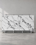 Bvlgari Black full sintered stone slab on an A-frame with white and charcoal breccia veining