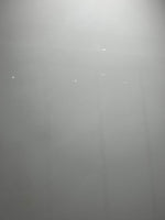 Cream White glossy sintered stone surface with subtle warm white tone