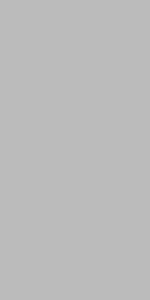 Soft gray sintered stone surface texture with low contrast movement