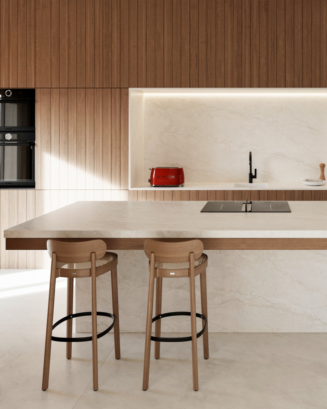 Minimalist warm kitchen featuring a beige marble-look sintered stone island and matching countertops with wooden cabinetry.