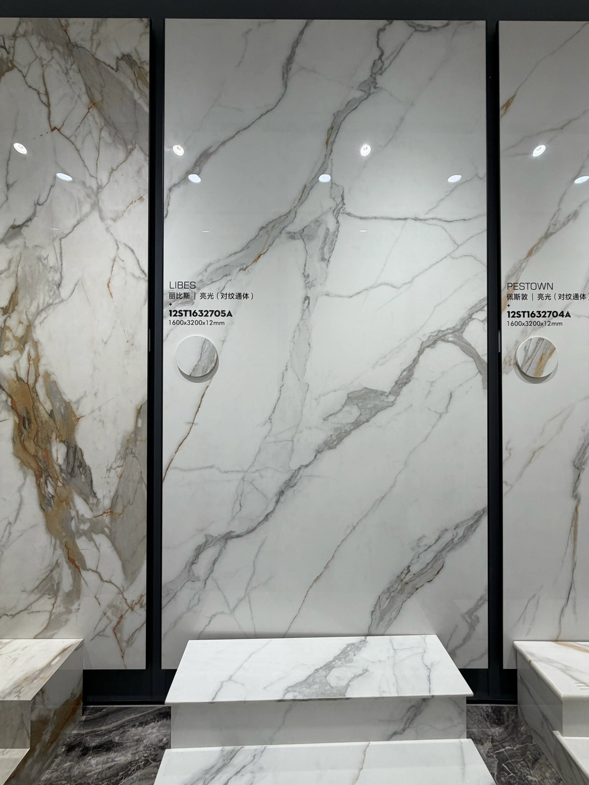 Libes polished white sintered stone slab displayed upright in the showroom