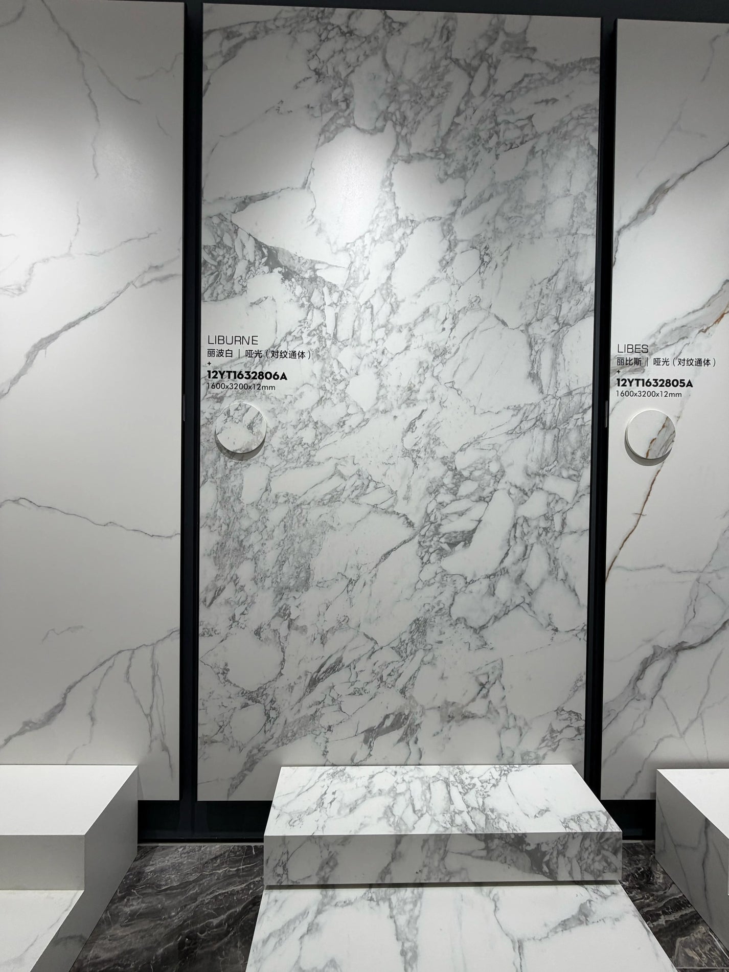 Libourne polished white sintered stone slab displayed in the showroom