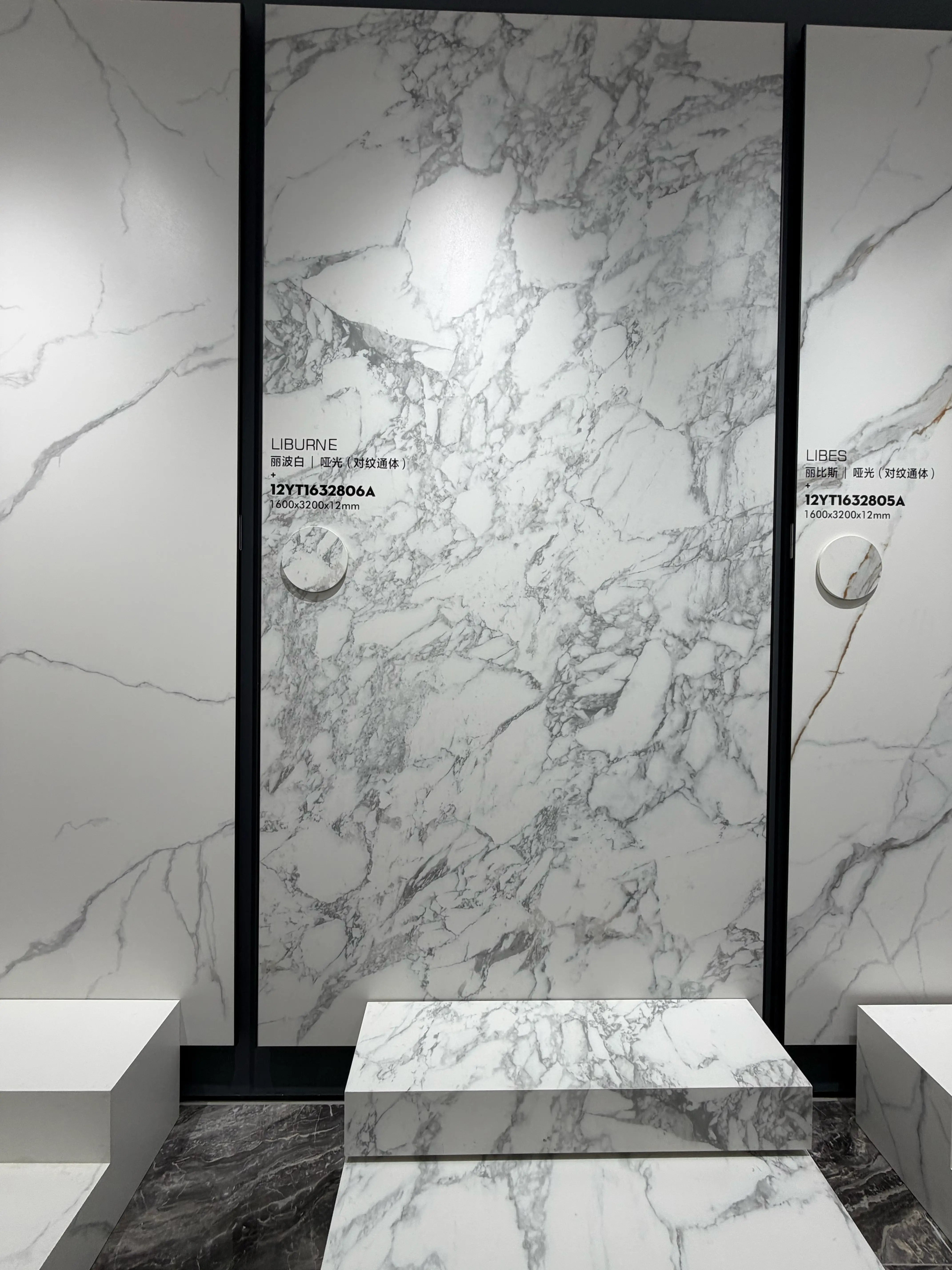 Libourne polished white sintered stone slab displayed in the showroom