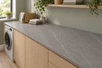 Lightning Grey sintered stone laundry worktop with pale veins on a mid-grey surface
