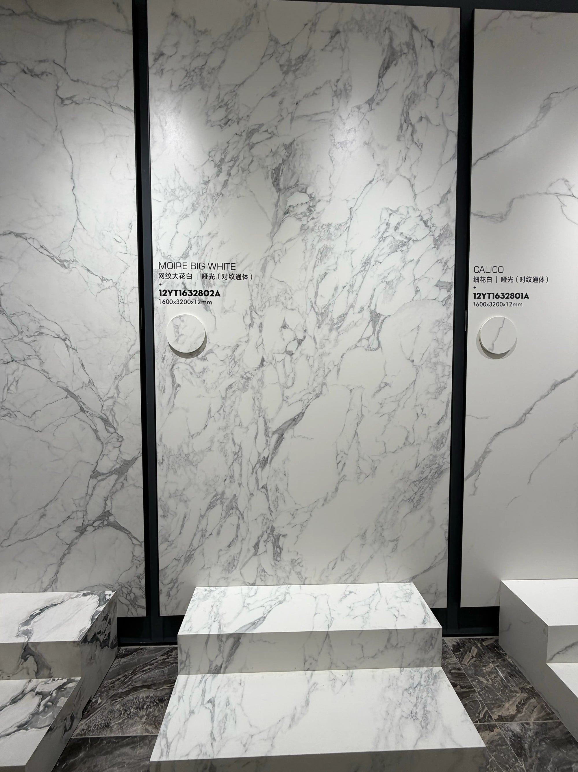 Wide showroom display of the Moire Big White matte slab