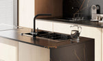 Nero Portoro sintered stone kitchen island, countertop and splashback with fine gold veins