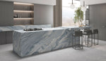 Palissandro Blue full-body sintered stone applied to a modern kitchen island and backsplash