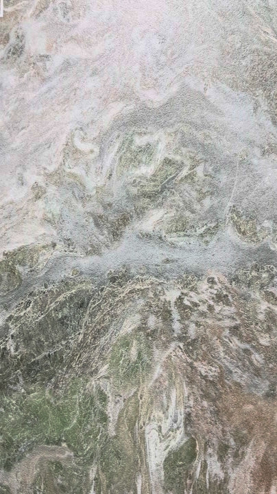 Video close-up of the sage jade-look sintered stone pattern and embossed surface