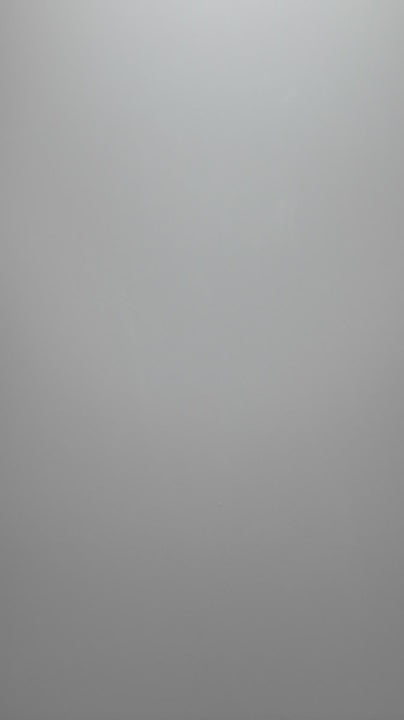 Silver gray sintered stone slab video showing soft satin surface