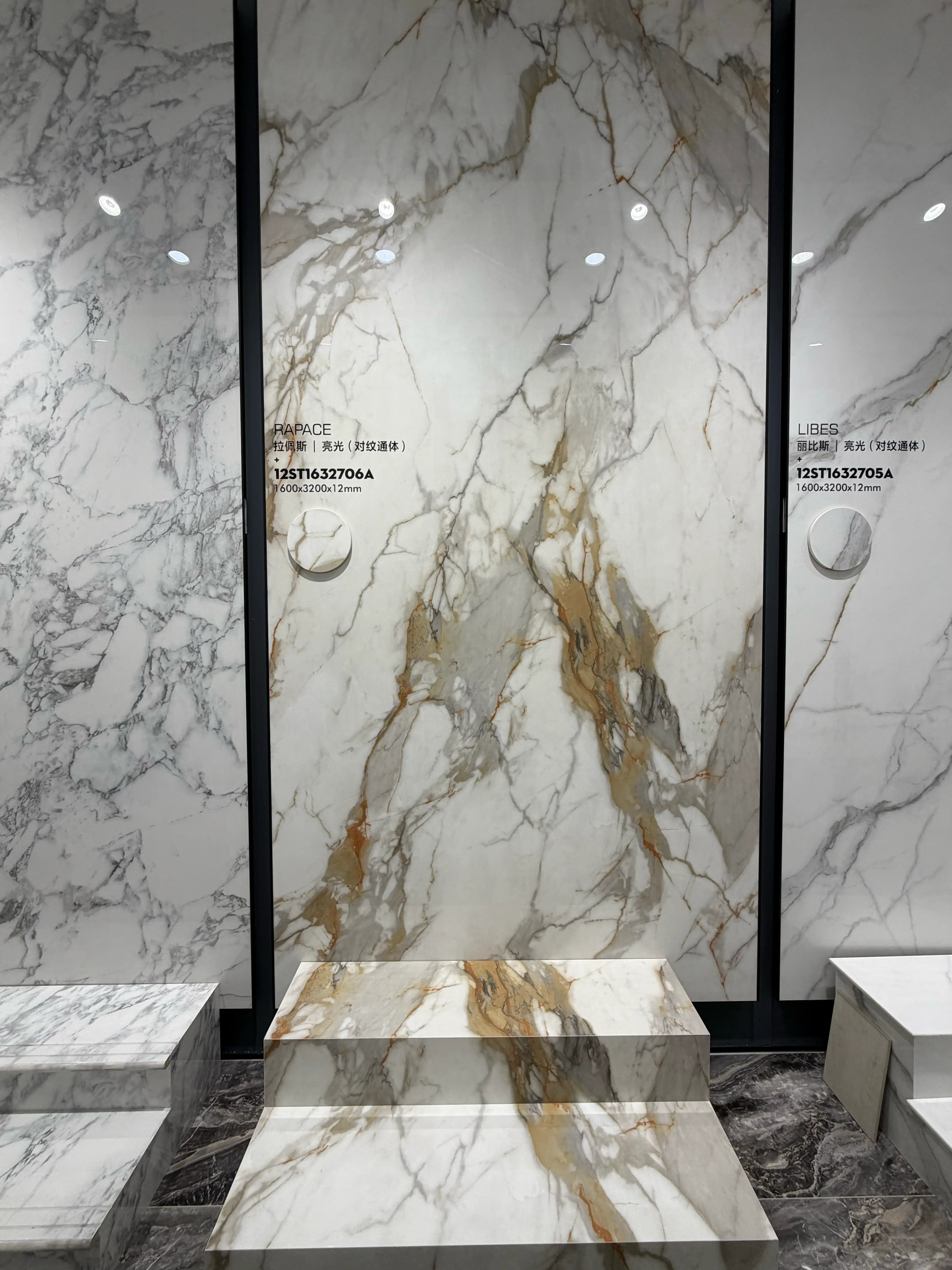 Rapace polished golden breccia-look slab displayed in the showroom