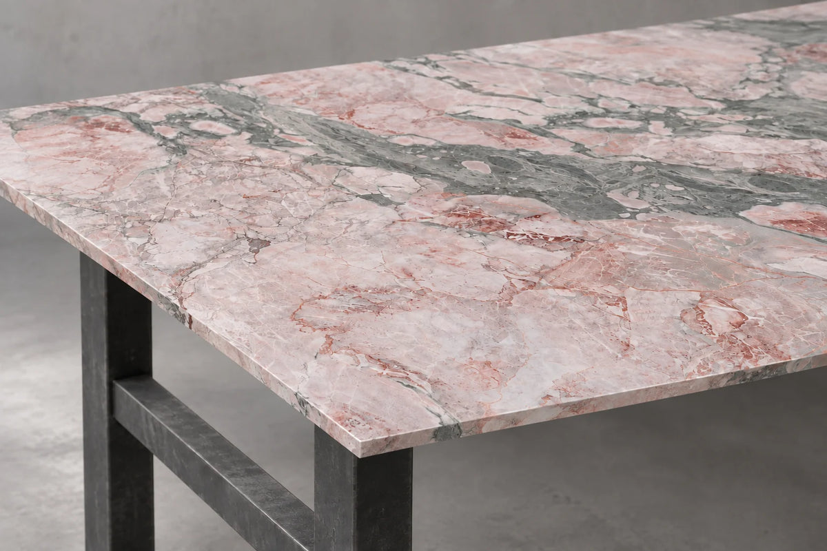 Close view of Seasons Pink sintered stone showing its thin coordinated face and edge