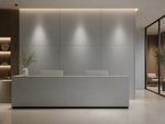 Silver gray sintered stone used for a reception desk and large wall panels