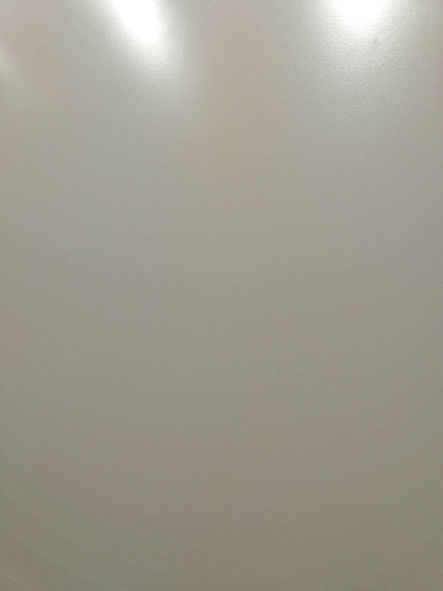 Soft Beige sintered stone surface texture with warm plain color and gentle sheen