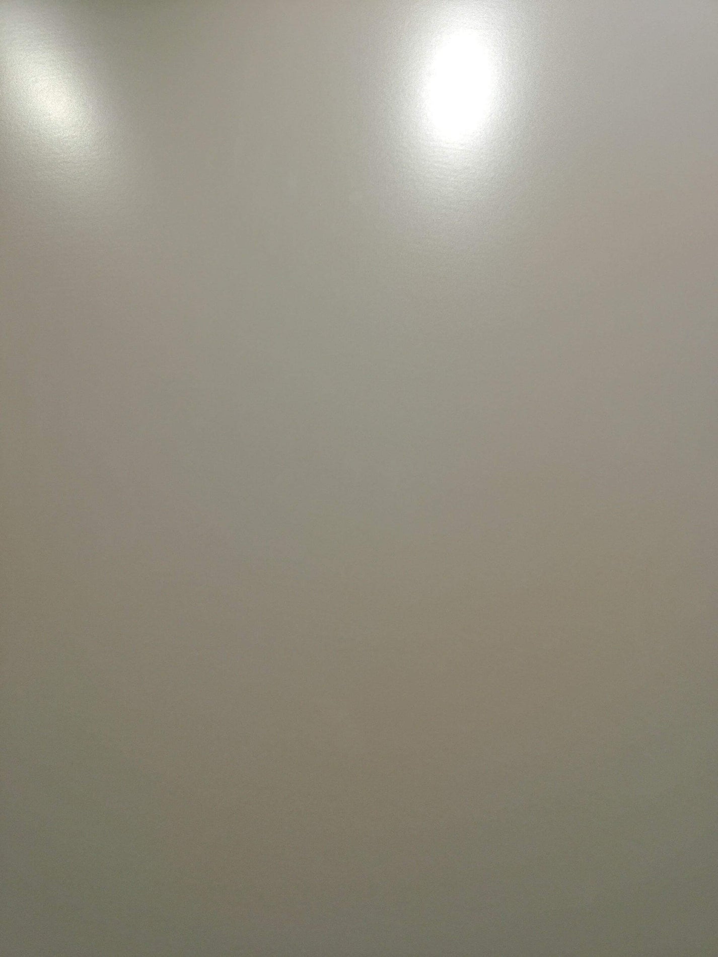Soft Beige soft gloss sintered stone close-up with subtle warm neutral variation