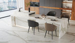 Super Snow White sintered stone island dining table and floor in a modern kitchen