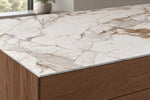 Top Fish Maw Gold countertop with a slim 12 mm exposed edge above wood cabinetry