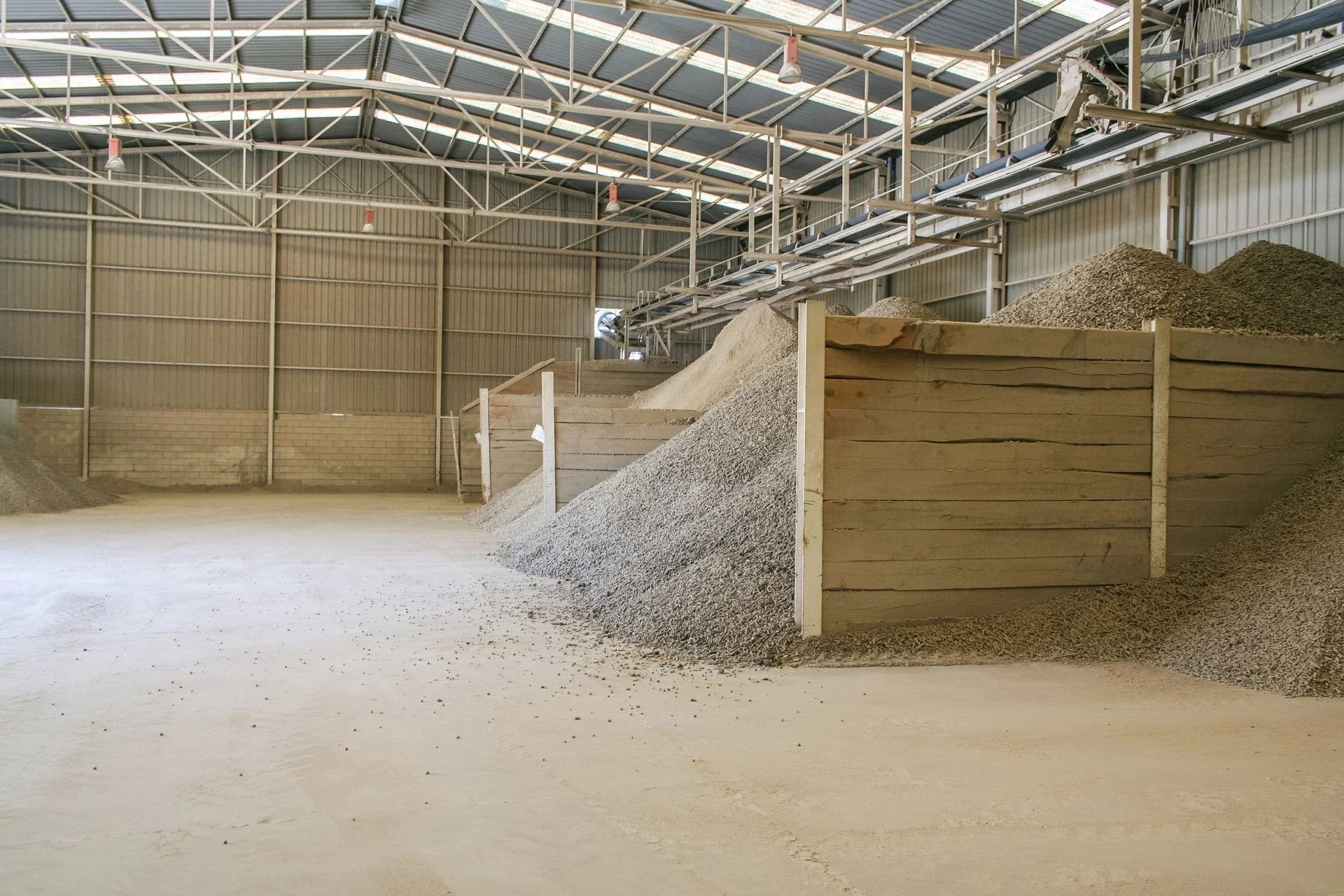 Raw mineral materials being sampled and checked before sintered stone production