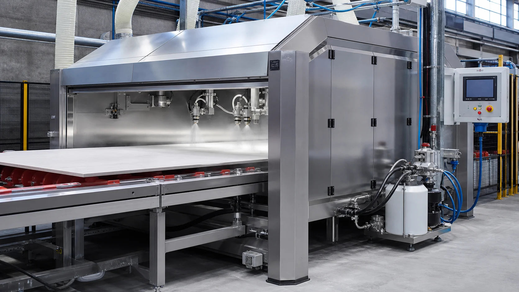 Surface coating being applied to a slab body before firing